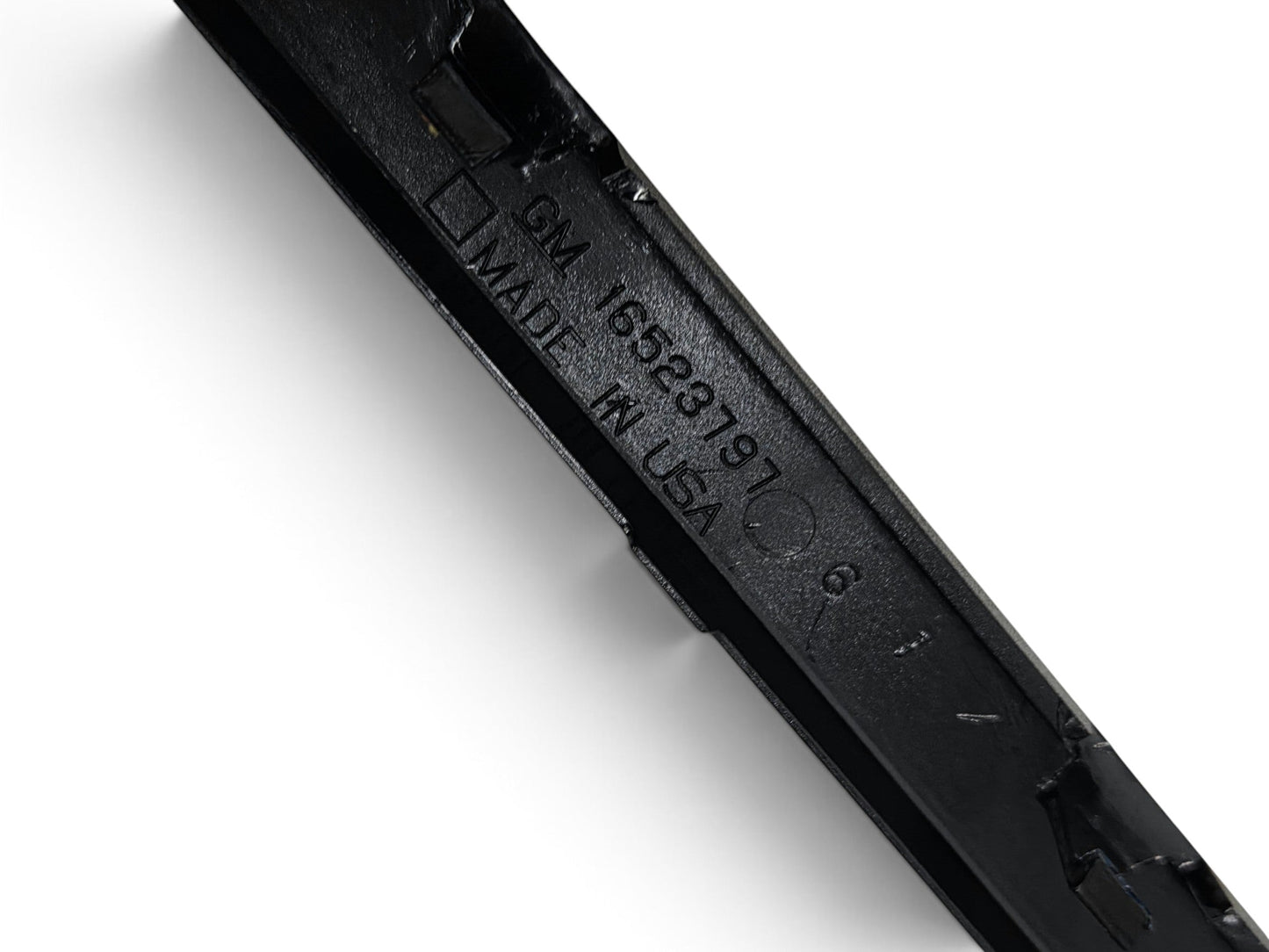 Send it Auto Parts black OEM GM license plate frame for 1997-2004 Corvette C5 showing part number 16523797