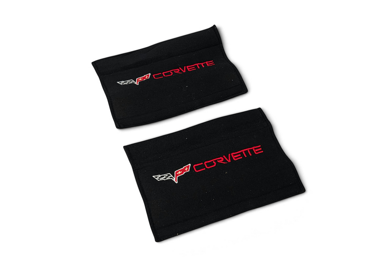 Send it Auto Parts black seat belt covers with red embroidered Corvette C6 logos for 2005-2013 models