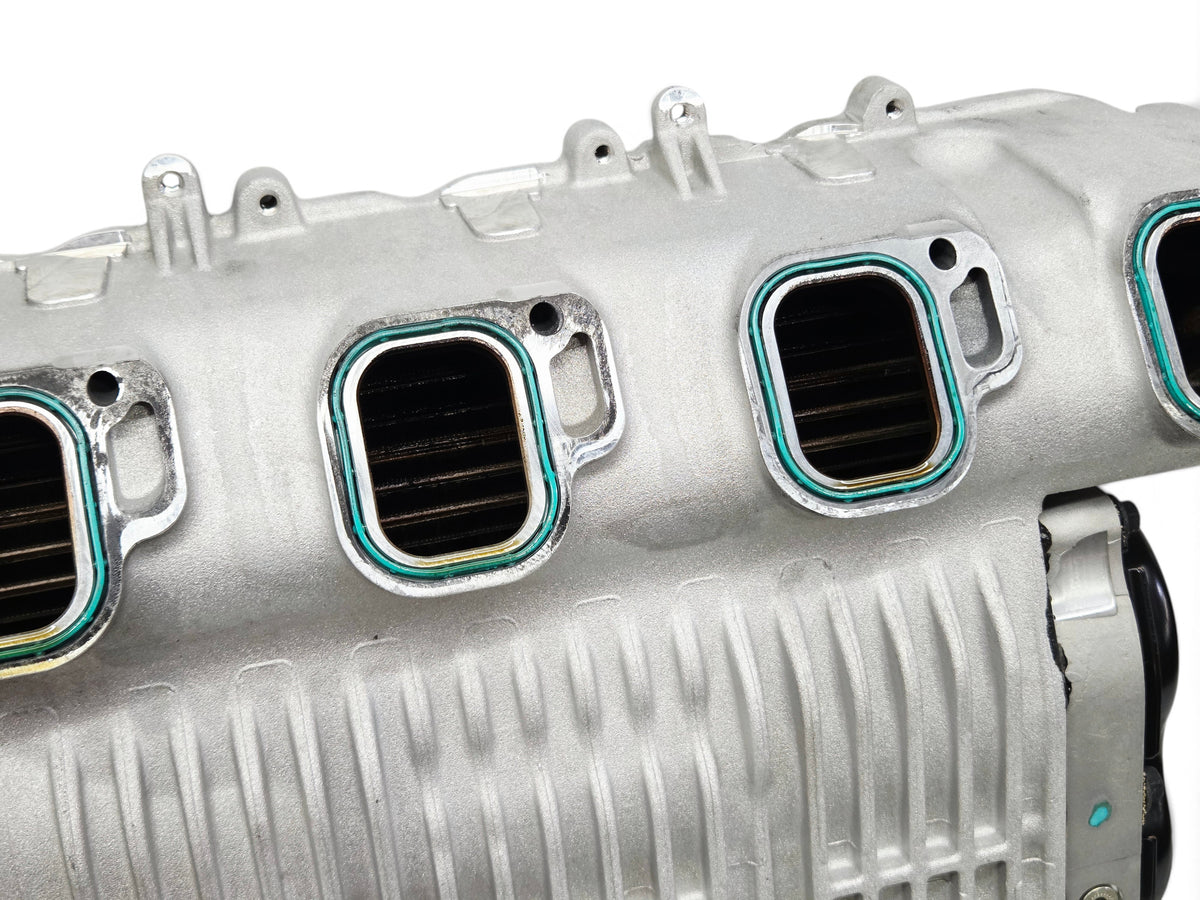 Send it Auto Parts Chevy Corvette C7 Z06 LT4 dry sump supercharger assembly with metallic finish and green gaskets