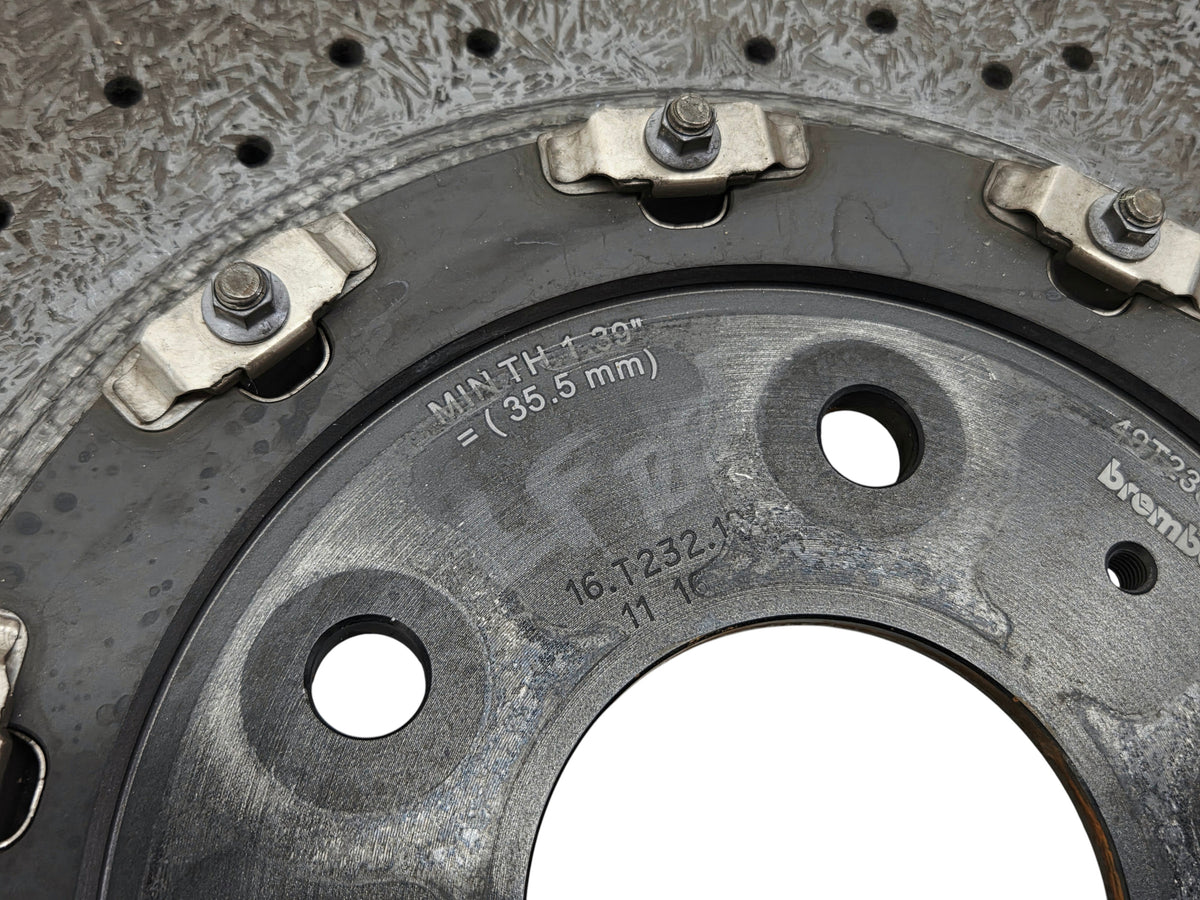 Send it Auto Parts carbon ceramic front brake rotor for Corvette C7 Z06, showing minimum thickness markings.