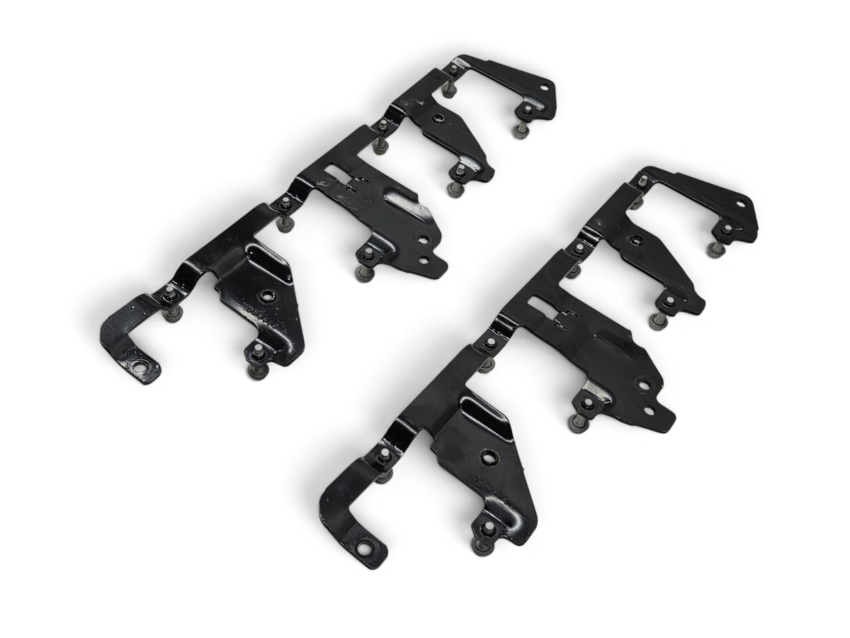 Send it Auto Parts OEM black metal ignition coil brackets for GM LS engines, including mounting bolts.