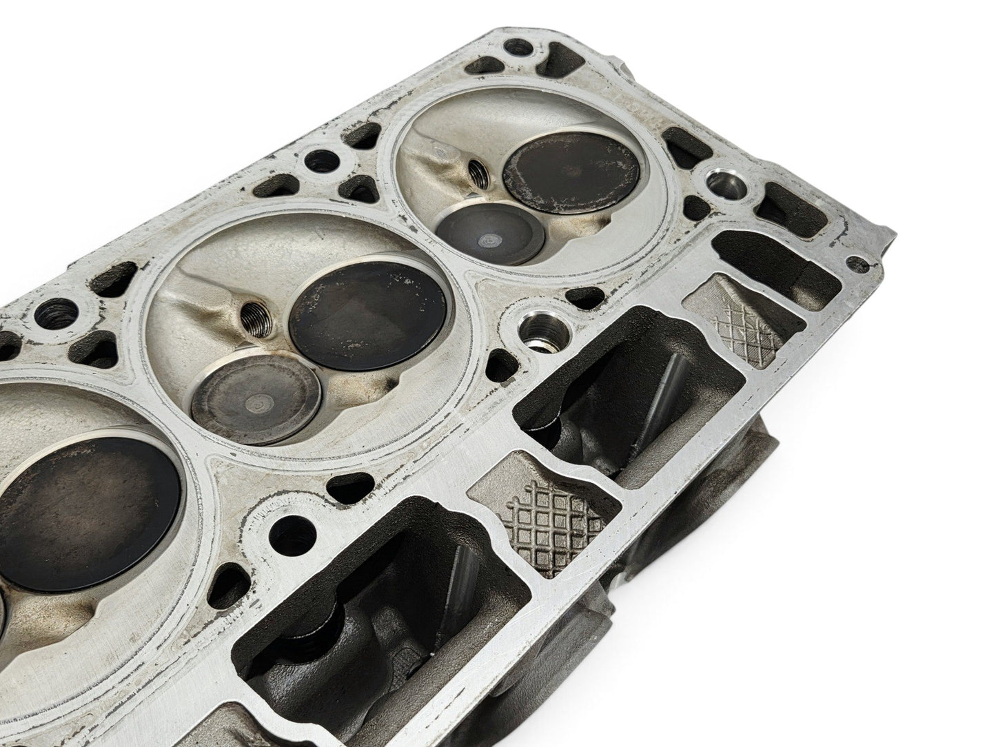 Send it Auto Parts OEM GM LT4 6.2L cylinder head with large injector holes and valves for Corvette and Camaro engines.