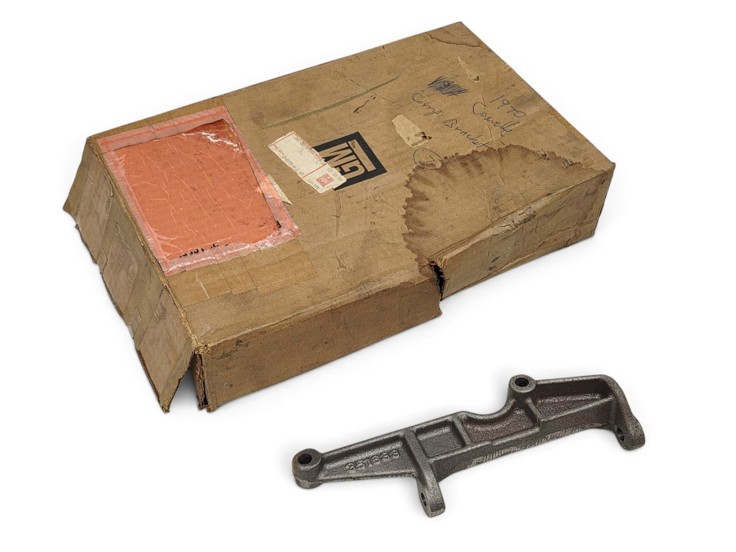 Send it Auto Parts OEM GM 1964-1976 Corvette C2 C3 A/C compressor lower bracket with original vintage cardboard box