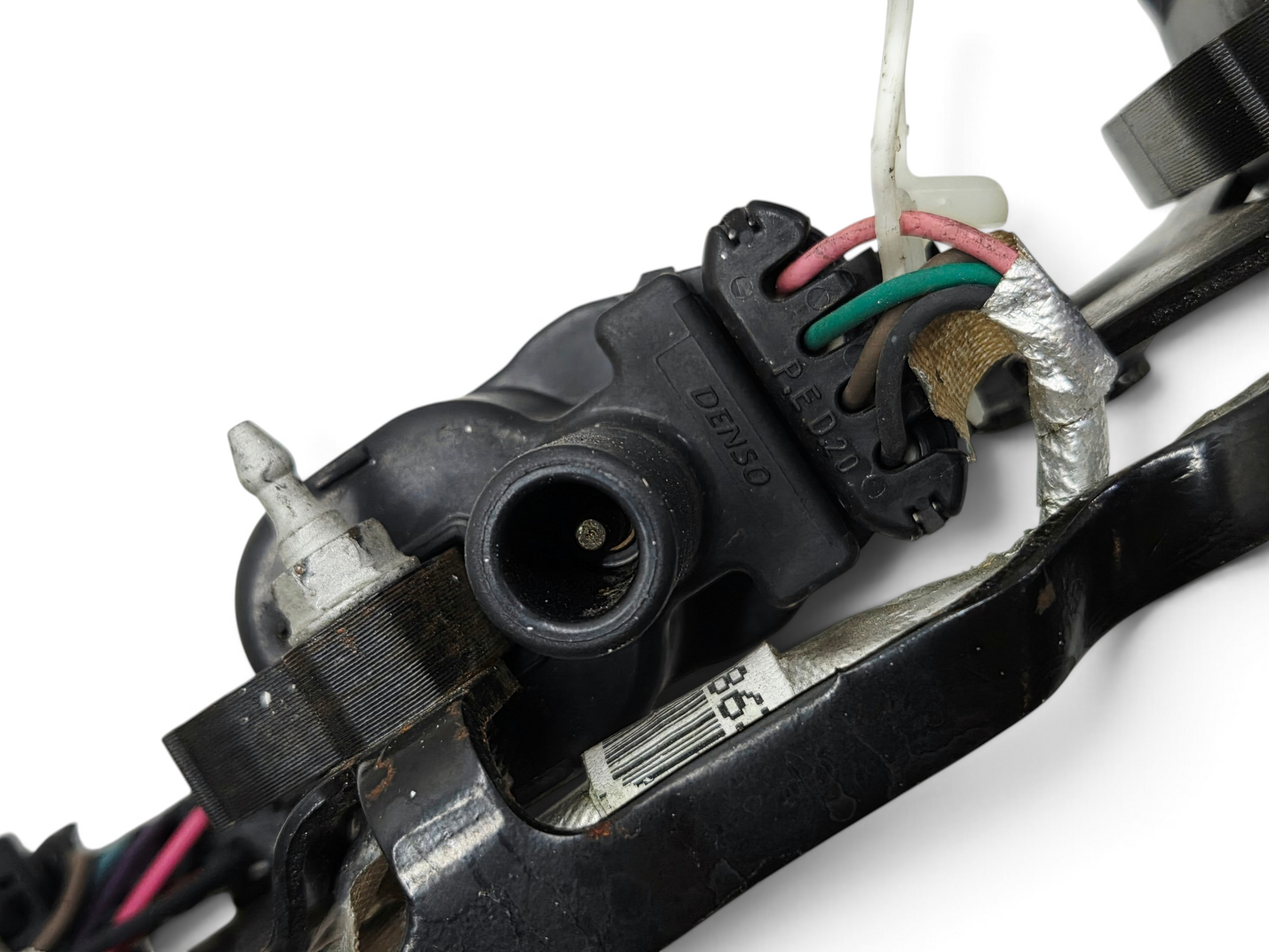 Send it Auto Parts OEM GM LS1 LS6 ignition coil, bracket, and wiring harness for Corvette, Camaro, and Firebird.