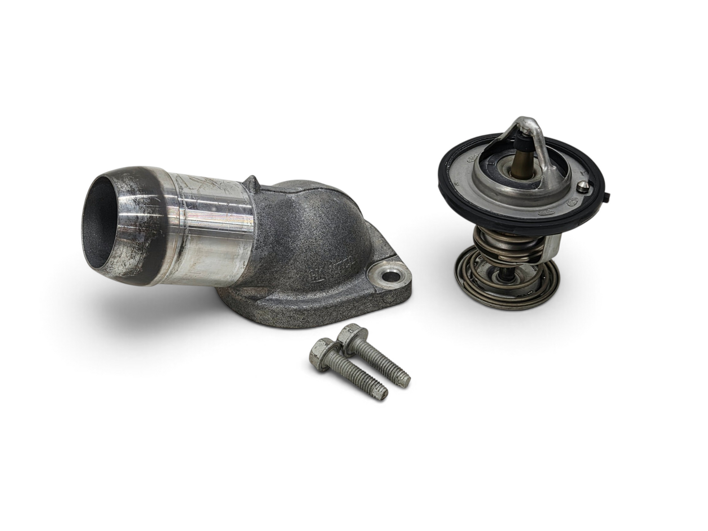 Send it Auto Parts OEM GM LS truck thermostat housing and water neck with included bolts and thermostat component.