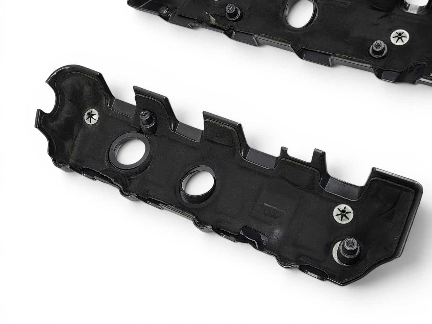 Send it Auto Parts OEM black plastic coil covers for Chevy Camaro LT1 LT4 6.2L V8 engines, underside view.