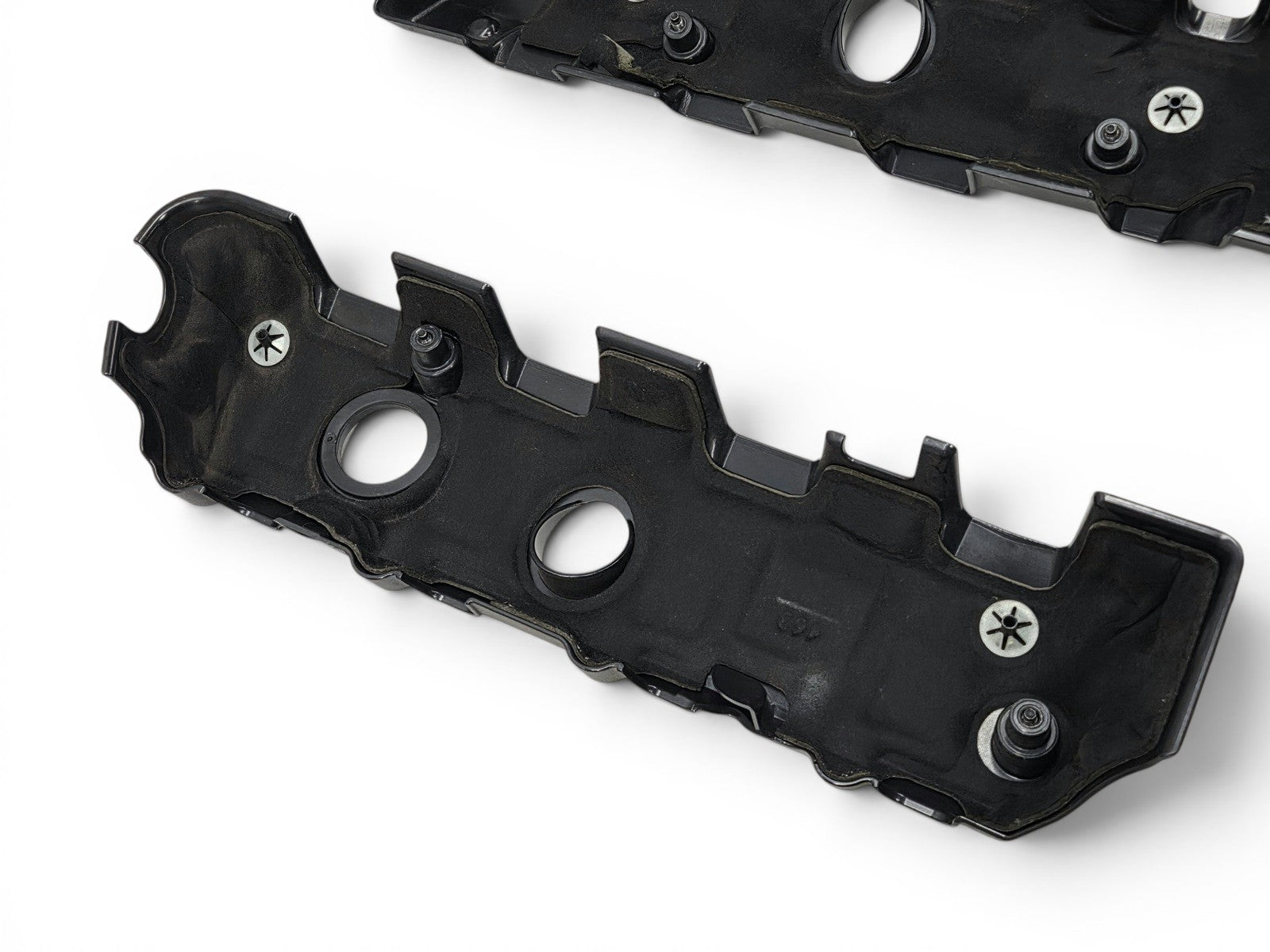 Send it Auto Parts OEM black plastic coil covers for Chevy Camaro LT1 LT4 6.2L V8 engines, underside view.