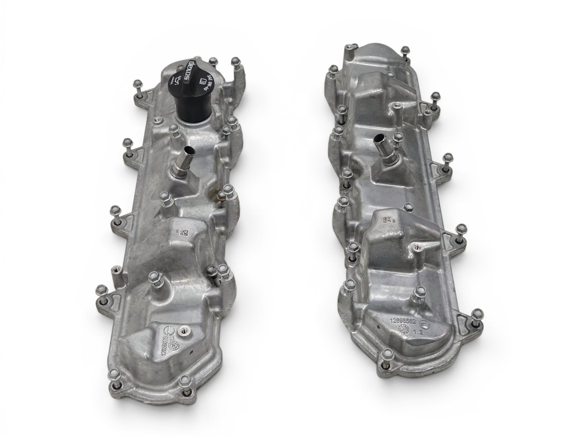 Send it Auto Parts OEM GM valve covers for 2016-2024 LT1 LT4 engines, silver metal finish with oil cap included.