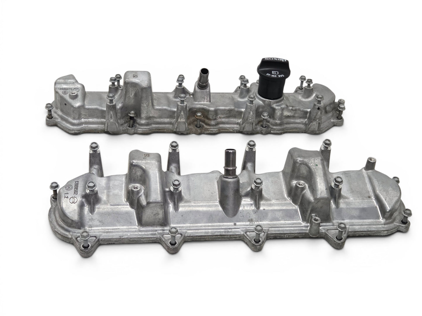 Send it Auto Parts OEM GM valve covers for 2016-2024 LT1 LT4 engines, silver aluminum finish with oil cap.