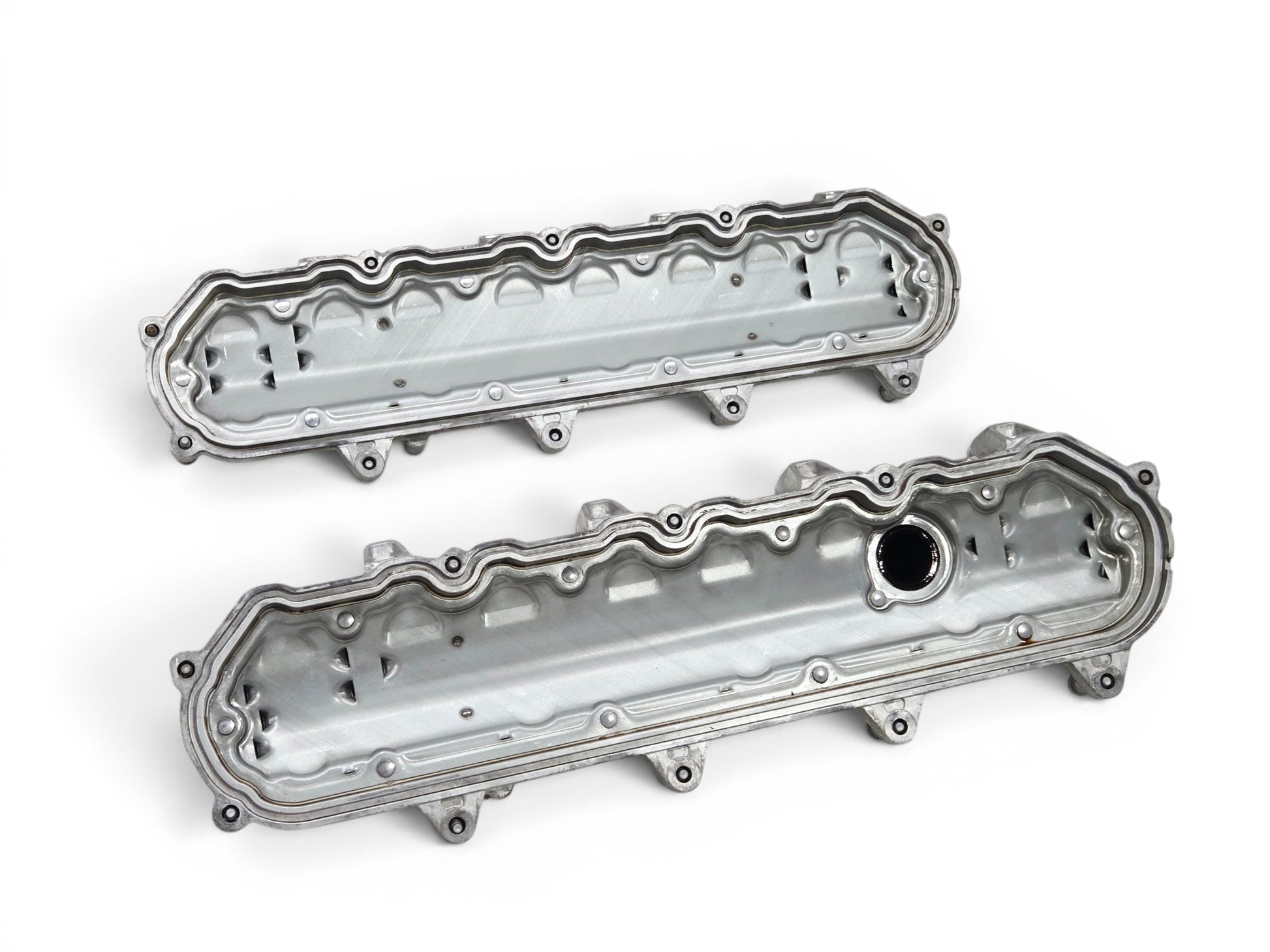 Send it Auto Parts OEM GM valve covers for 2016-2024 LT1 LT4 engines, showing interior view of metal components.
