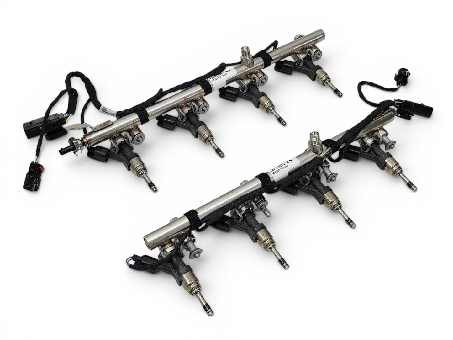 Send it Auto Parts OEM GM Gen V LT1 L86 fuel injectors with rails, wiring harnesses, and sensor on white background