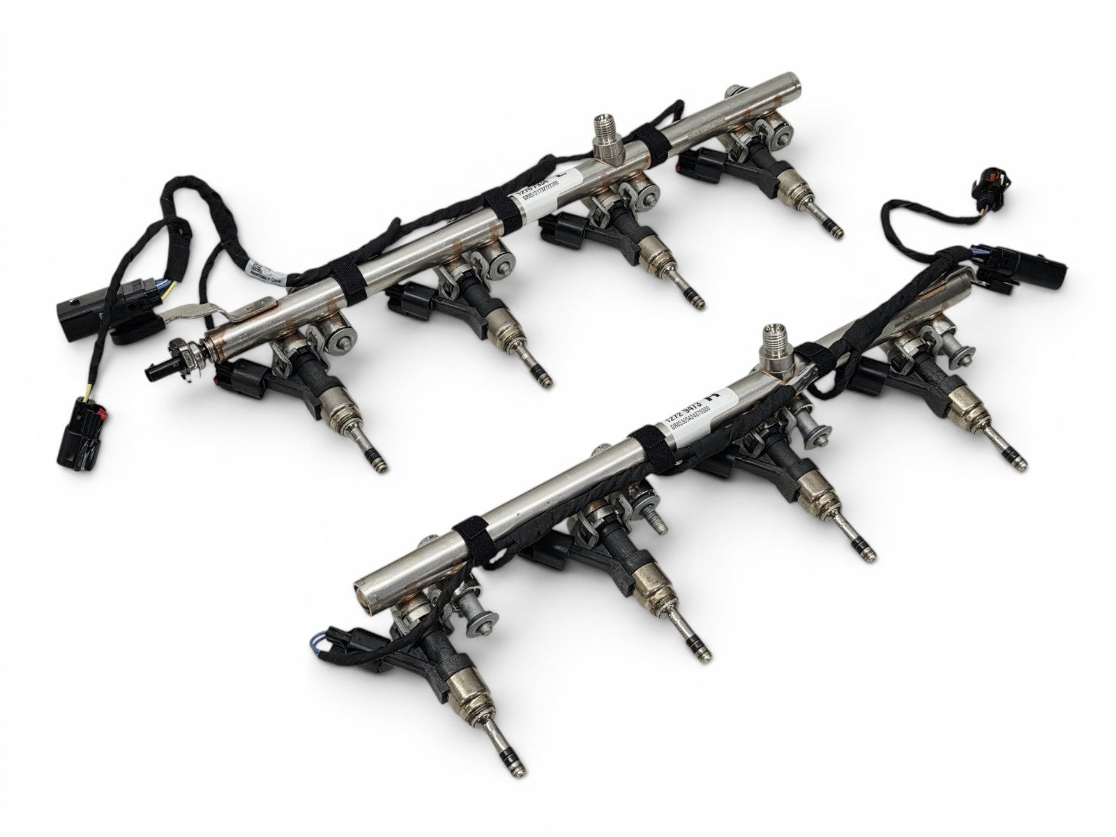 Send it Auto Parts OEM GM Gen V LT1 L86 fuel injectors with rails, wiring harnesses, and sensor on white background