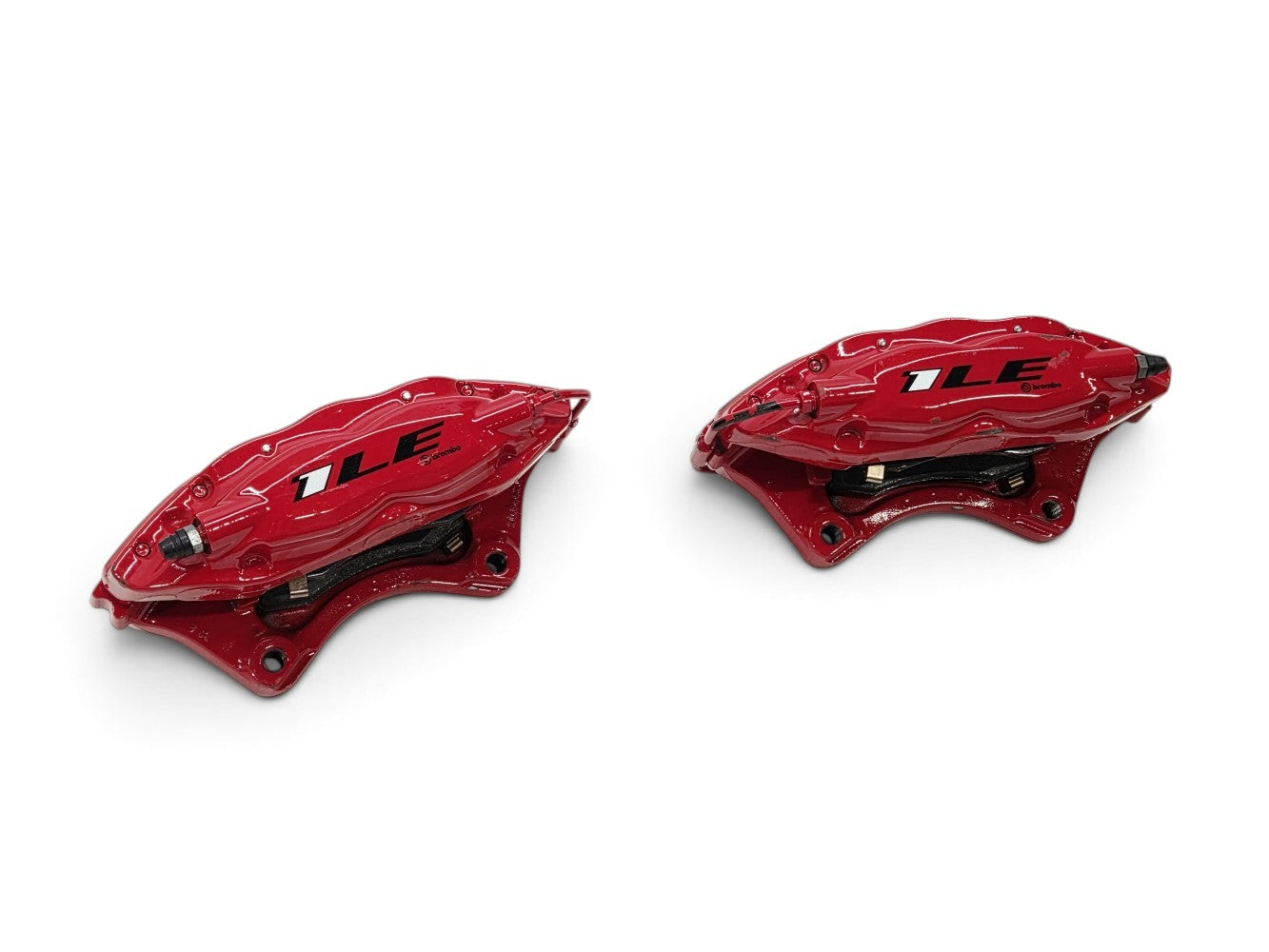 Send it Auto Parts OEM red Brembo rear brake calipers with pads for 2017-2024 Chevrolet Camaro ZL1
