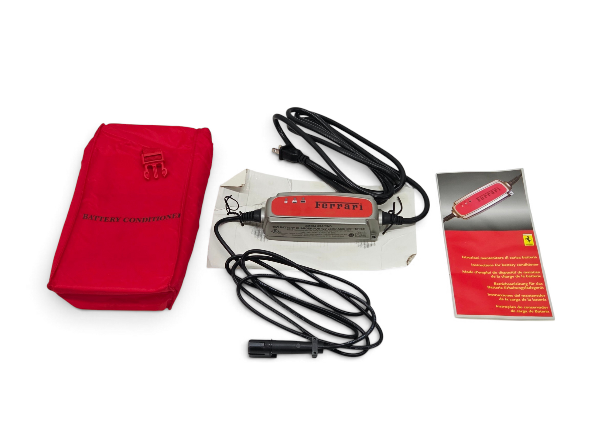 Send it Auto Parts OEM Ferrari battery charger and maintainer with red carry case and manual for 458 F430 612 599 models
