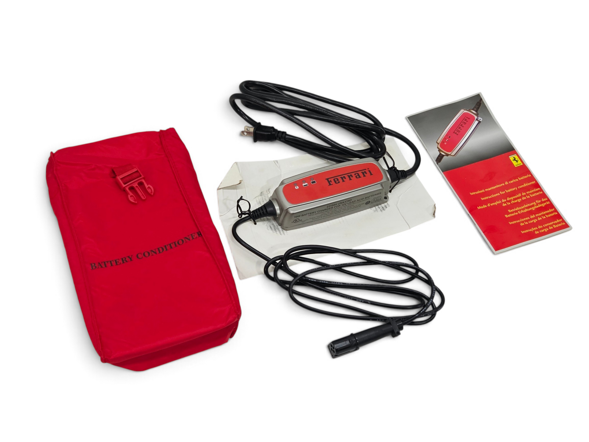Send it Auto Parts OEM Ferrari battery charger with red carry case and manual for 458, F430, 612, 599, and California