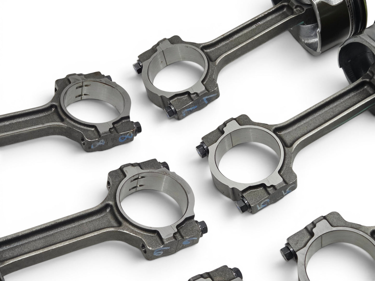Send it Auto Parts set of 8 OEM GM LS3 6.2L flat top pistons and connecting rods removed from a new crate engine.