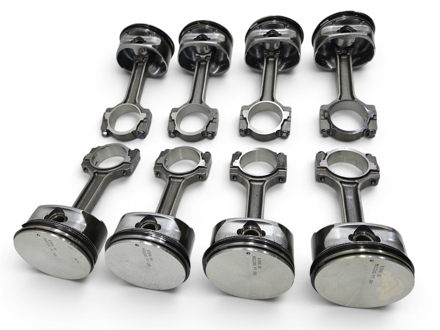 Send it Auto Parts set of 8 OEM GM LS3 6.2L flat top pistons and connecting rods for Chevy V8 engines.