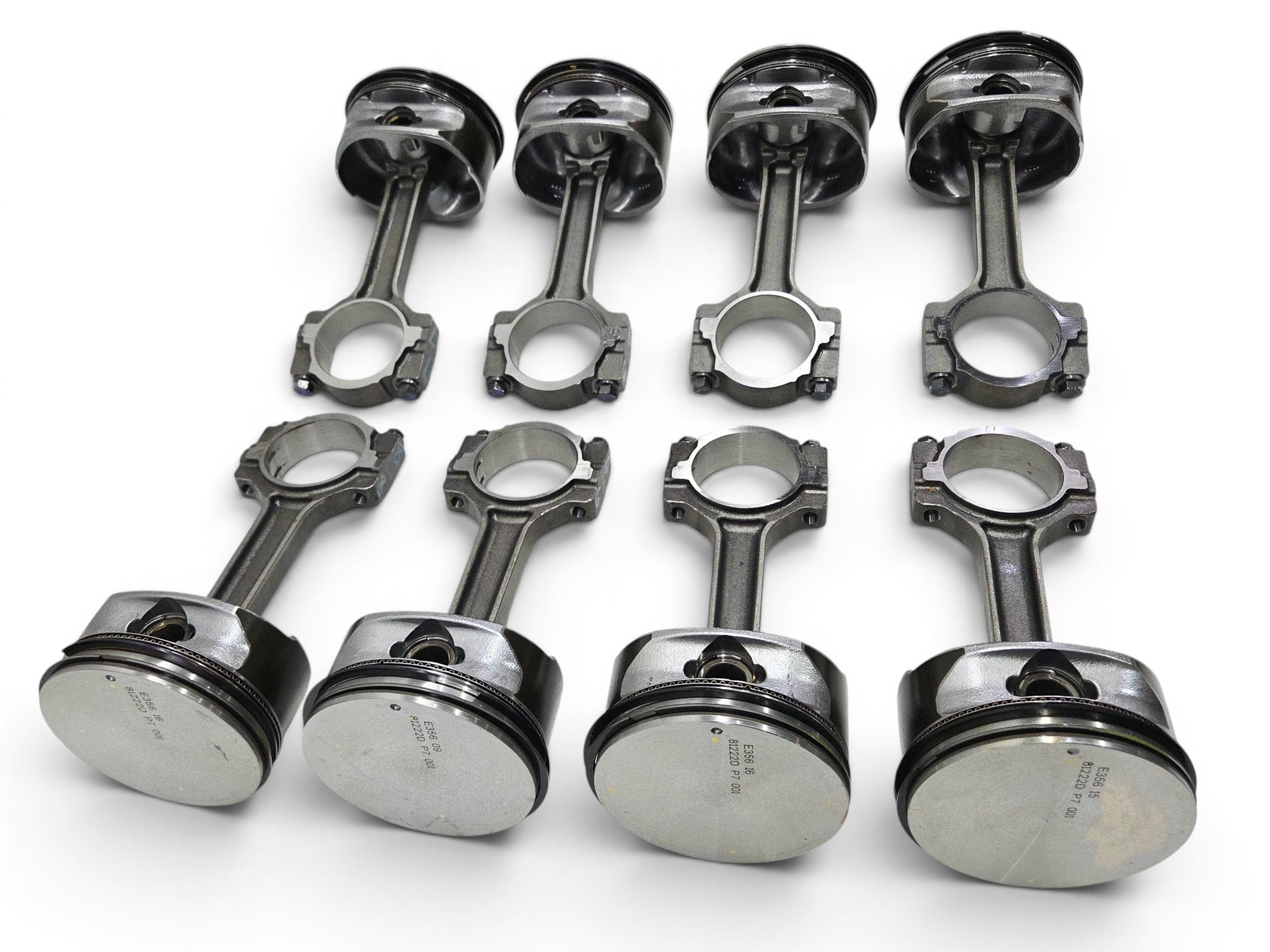 Send it Auto Parts set of 8 OEM GM LS3 6.2L flat top pistons and connecting rods for Chevy V8 engines.
