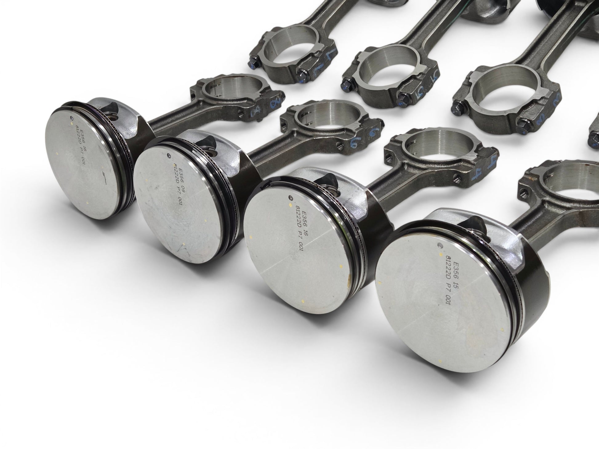 Send it Auto Parts set of 8 OEM GM LS3 6.2L flat top pistons and connecting rods for Chevrolet V8 engines.