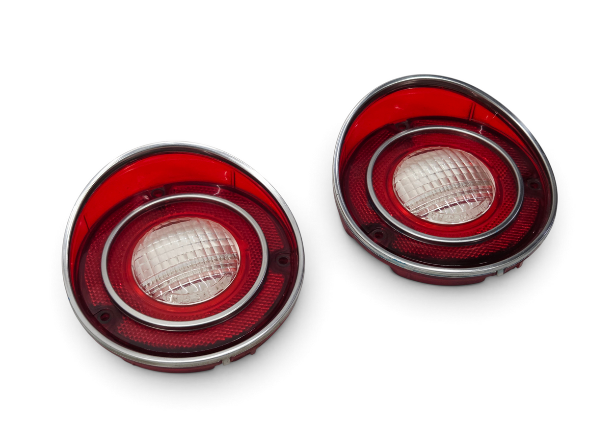 Send it Auto Parts OEM 1971 Corvette backup lamp tail light lenses with red and clear circular design