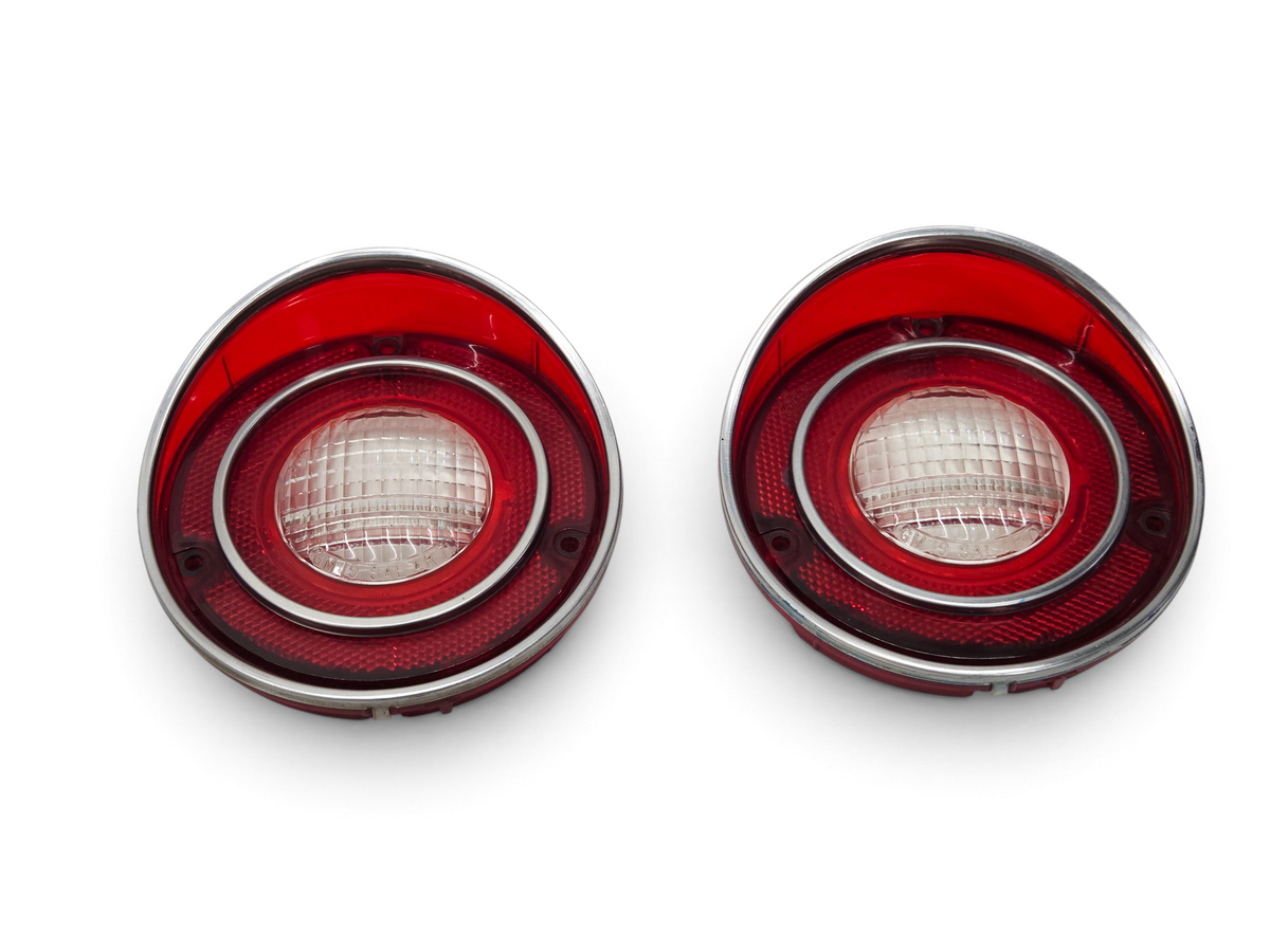 Send it Auto Parts pair of 1971 Corvette OEM backup lamp tail light lenses with red and clear plastic finish