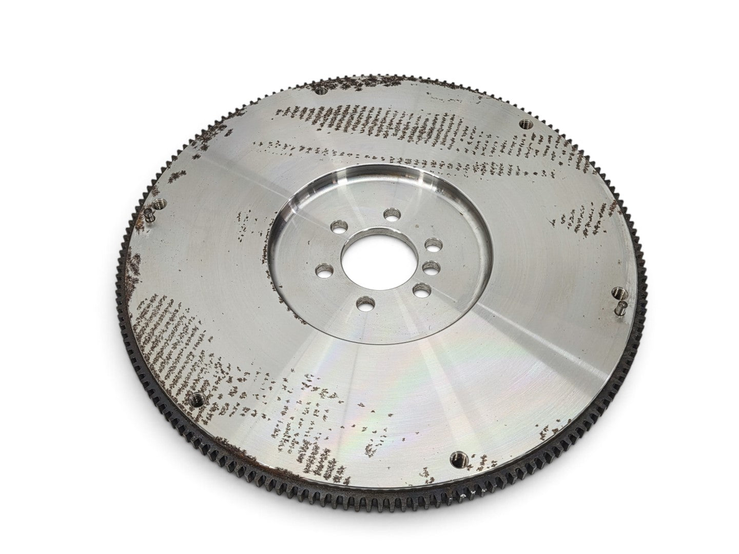 Send it Auto Parts Centerforce billet steel flywheel for LS engines with visible surface rust on the metal surface.
