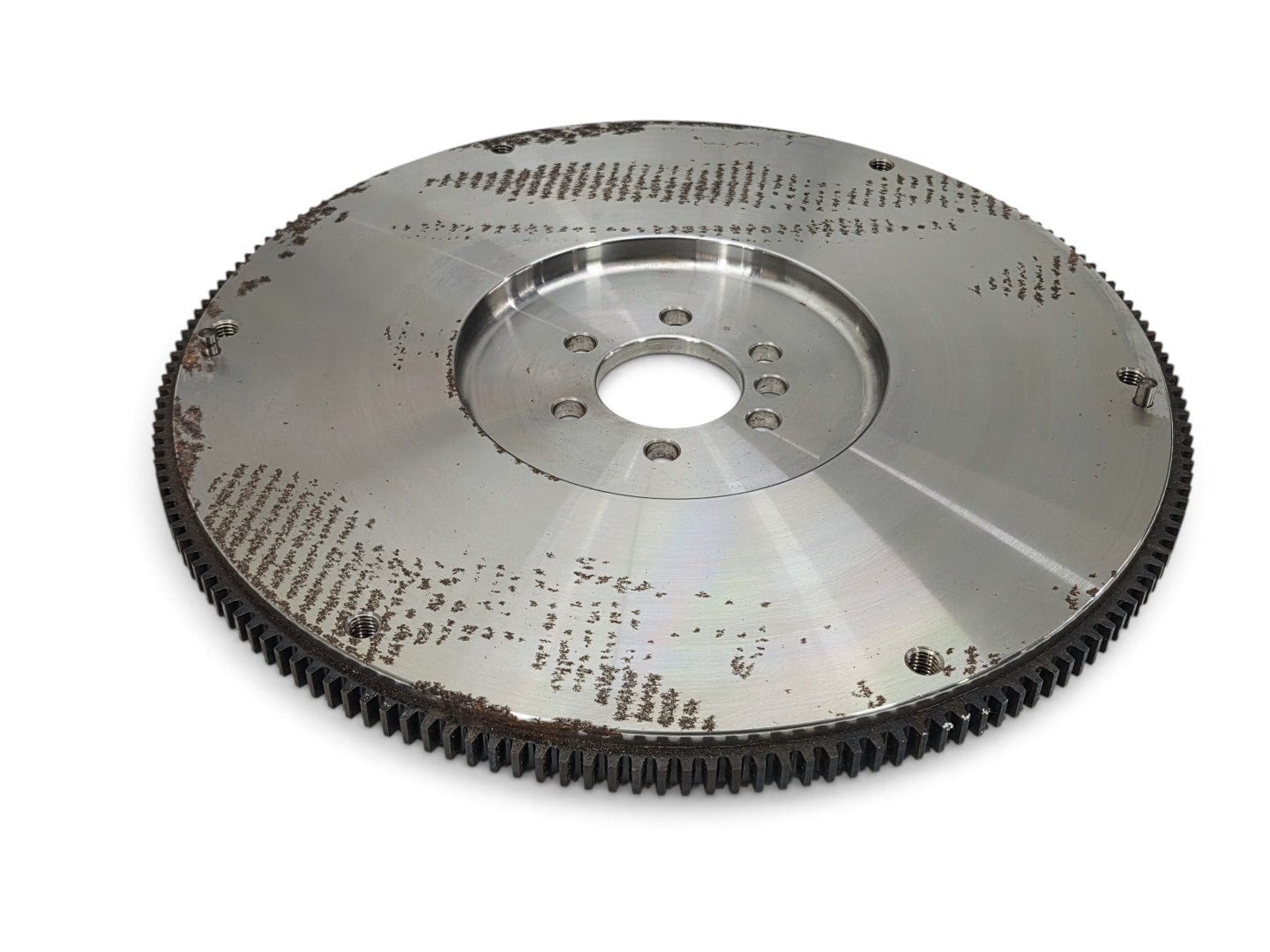 Send it Auto Parts Centerforce billet steel flywheel for LS engines with visible surface rust on the metal surface.