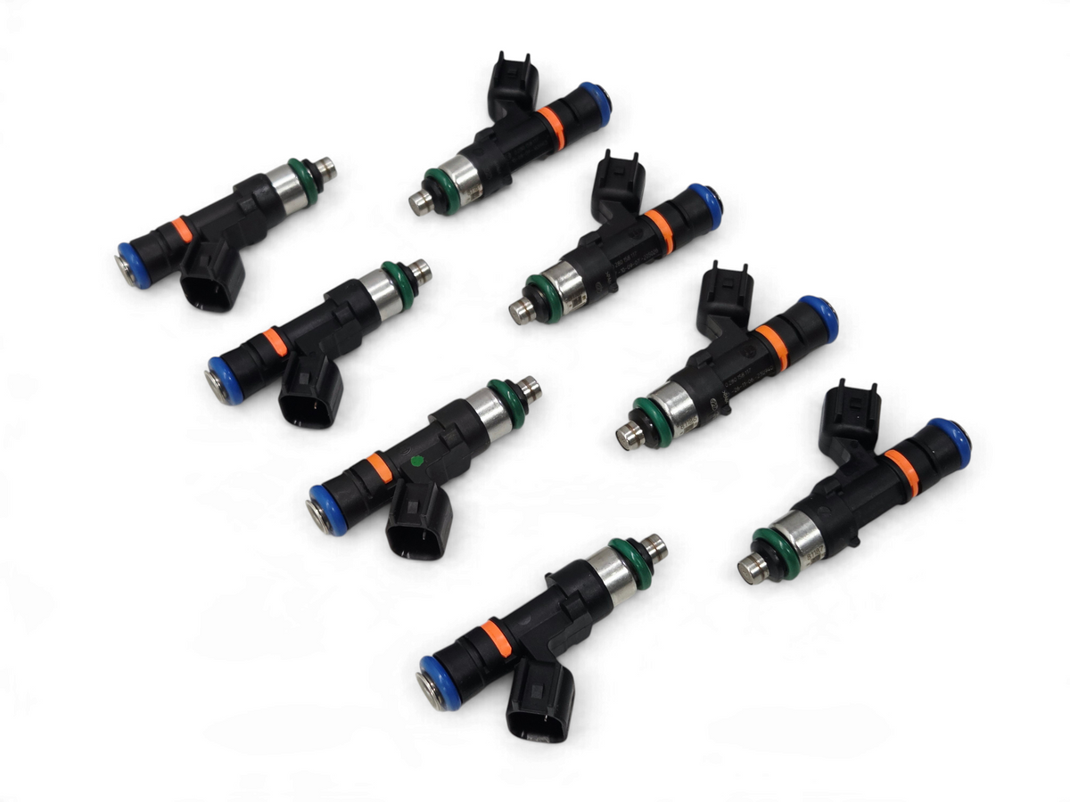 Send it Auto Parts set of eight genuine Bosch 0280158117 550cc EV14 fuel injectors with black bodies and colored seals.