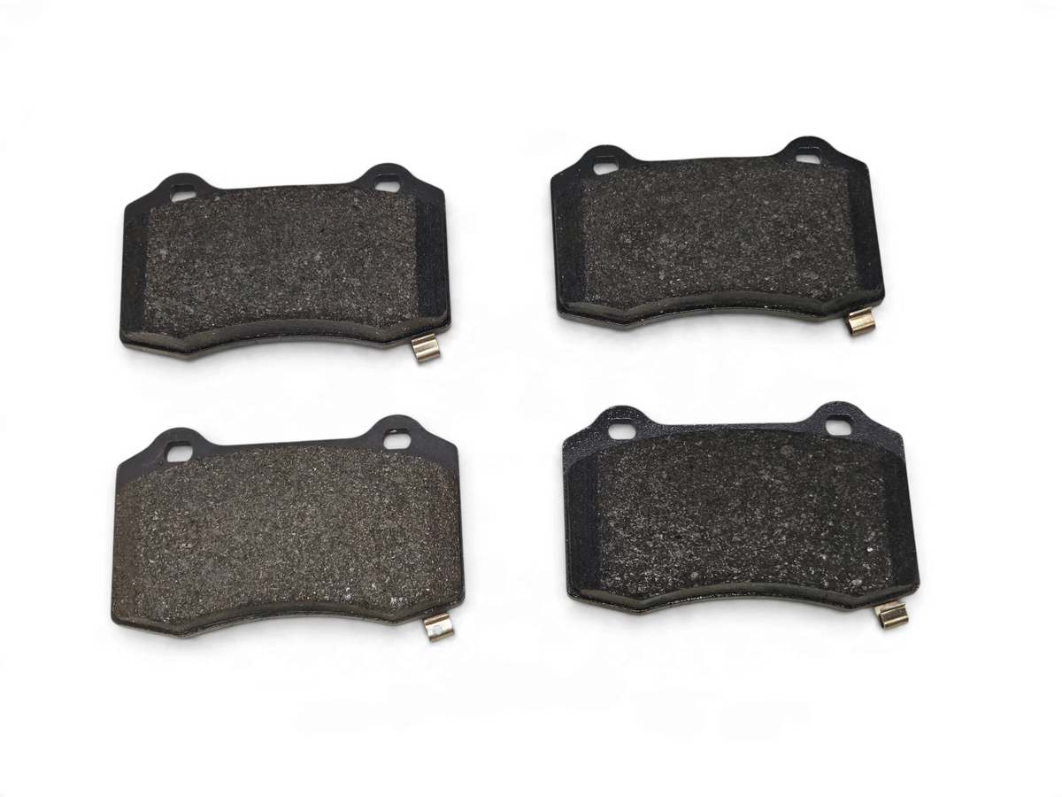 Send it Auto Parts OEM Brembo rear disc brake pads for Chevrolet Camaro ZL1 and Cadillac CTS-V performance vehicles.