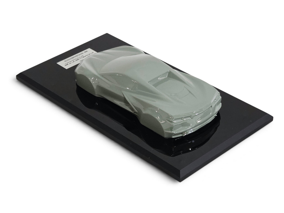 Send it Auto Parts 1:18 scale Cacti Green Corvette C8 speedshape model on a black display base