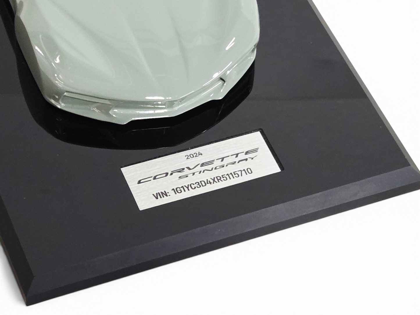 Send it Auto Parts 2024 Corvette C8 Cacti Green 1:18 scale speedshape model on a black display base