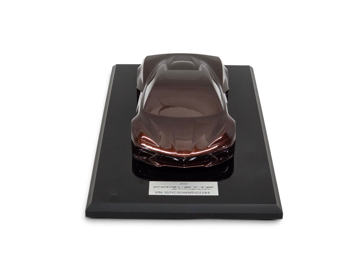 Send it Auto Parts 1:18 scale 2022 Corvette C8 Stingray speedshape model in Caffeine brown on a black display base