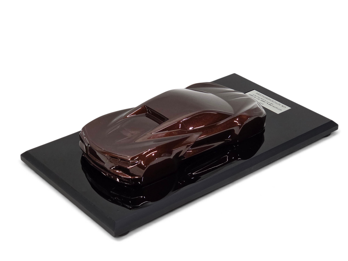 Send it Auto Parts 2022 Corvette C8 Stingray Caffeine speedshape model on a black display base