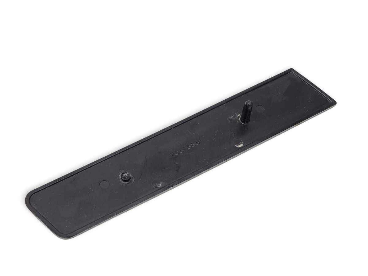Send it Auto Parts OEM GM Camaro IROCZ rocker panel emblem back view showing attachment tabs