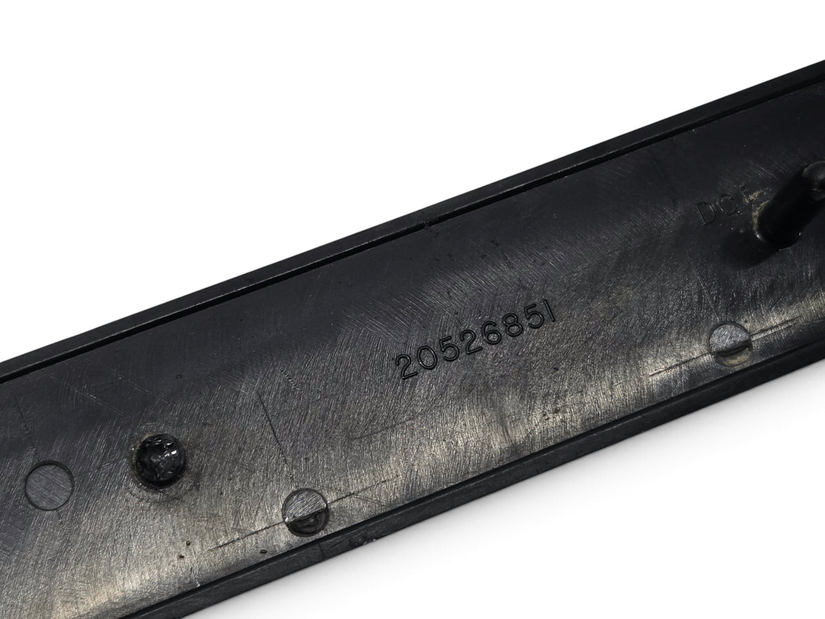 Send it Auto Parts OEM GM 1982-1992 Camaro IROCZ rocker panel emblem part number 20526851 showing back attachment tabs