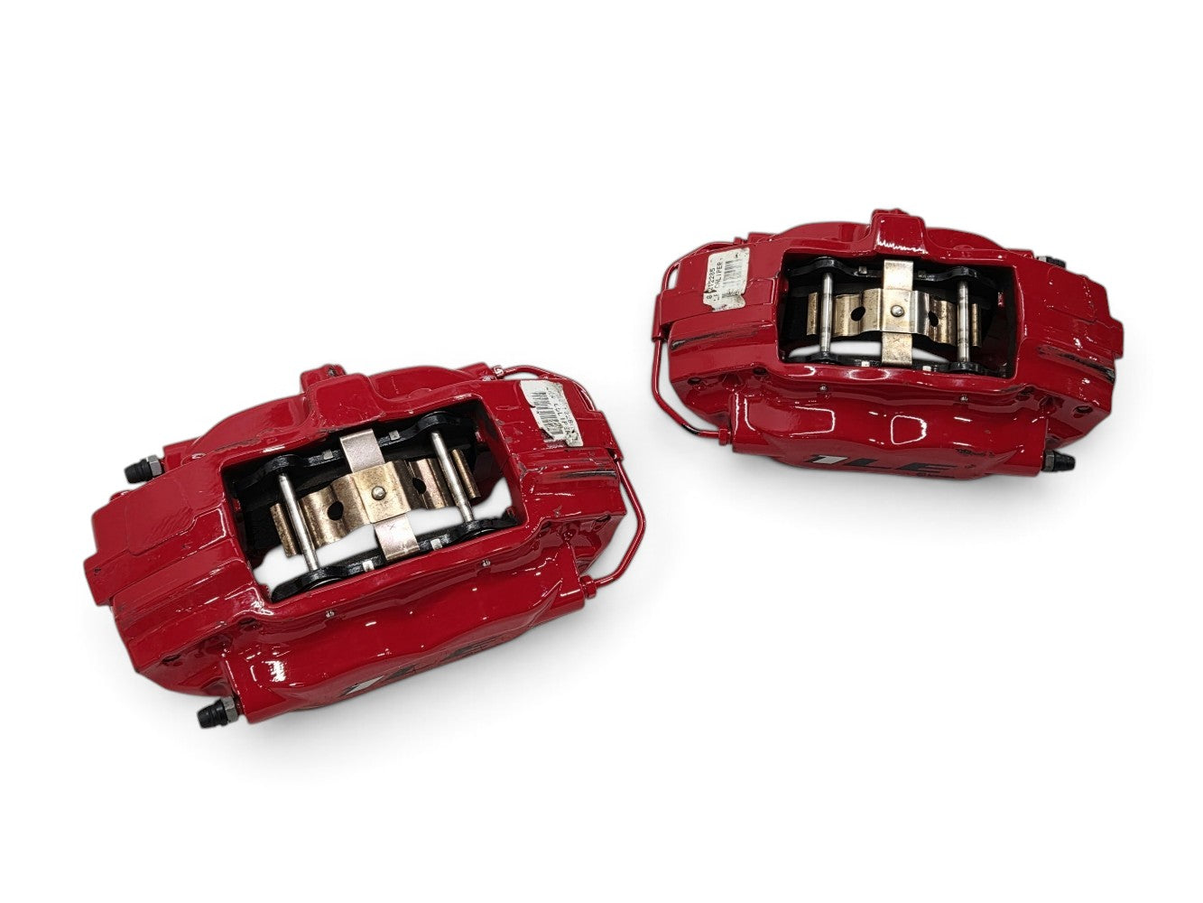 Send it Auto Parts pair of red OEM Brembo rear brake calipers with pads for 2017-2024 Chevrolet Camaro ZL1
