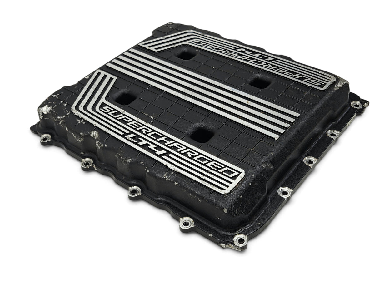 Send it Auto Parts damaged OEM GM supercharger cover lid for Chevy Camaro ZL1 LT4 6.2L V8 engine with visible cracks