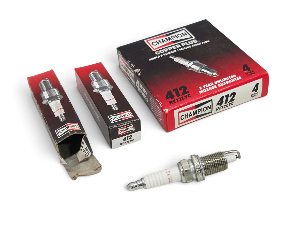 Send it Auto Parts Champion RC12LYC 412 copper core spark plugs with original red and white packaging
