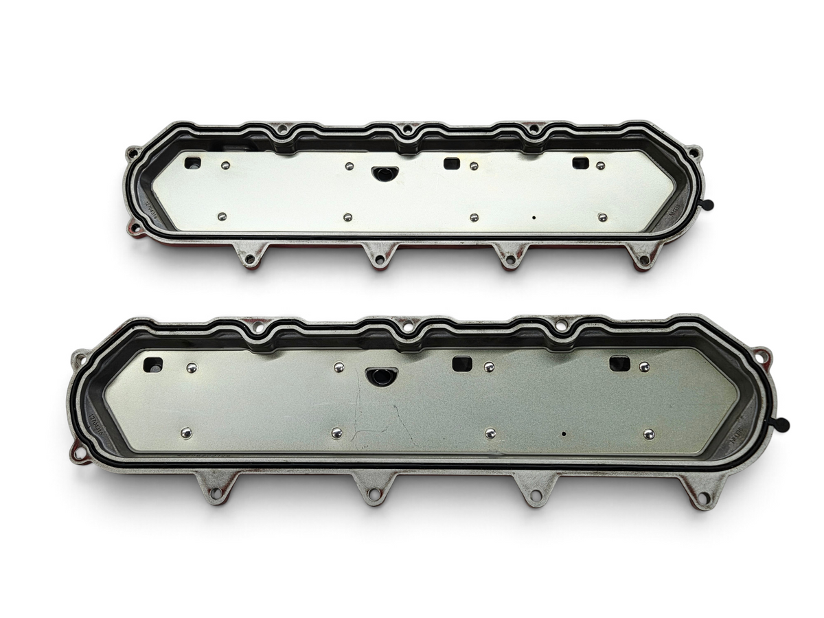 Send it Auto Parts OEM Chevy Corvette C8 Stingray 6.2L LT2 engine valve covers showing underside and gasket seals.