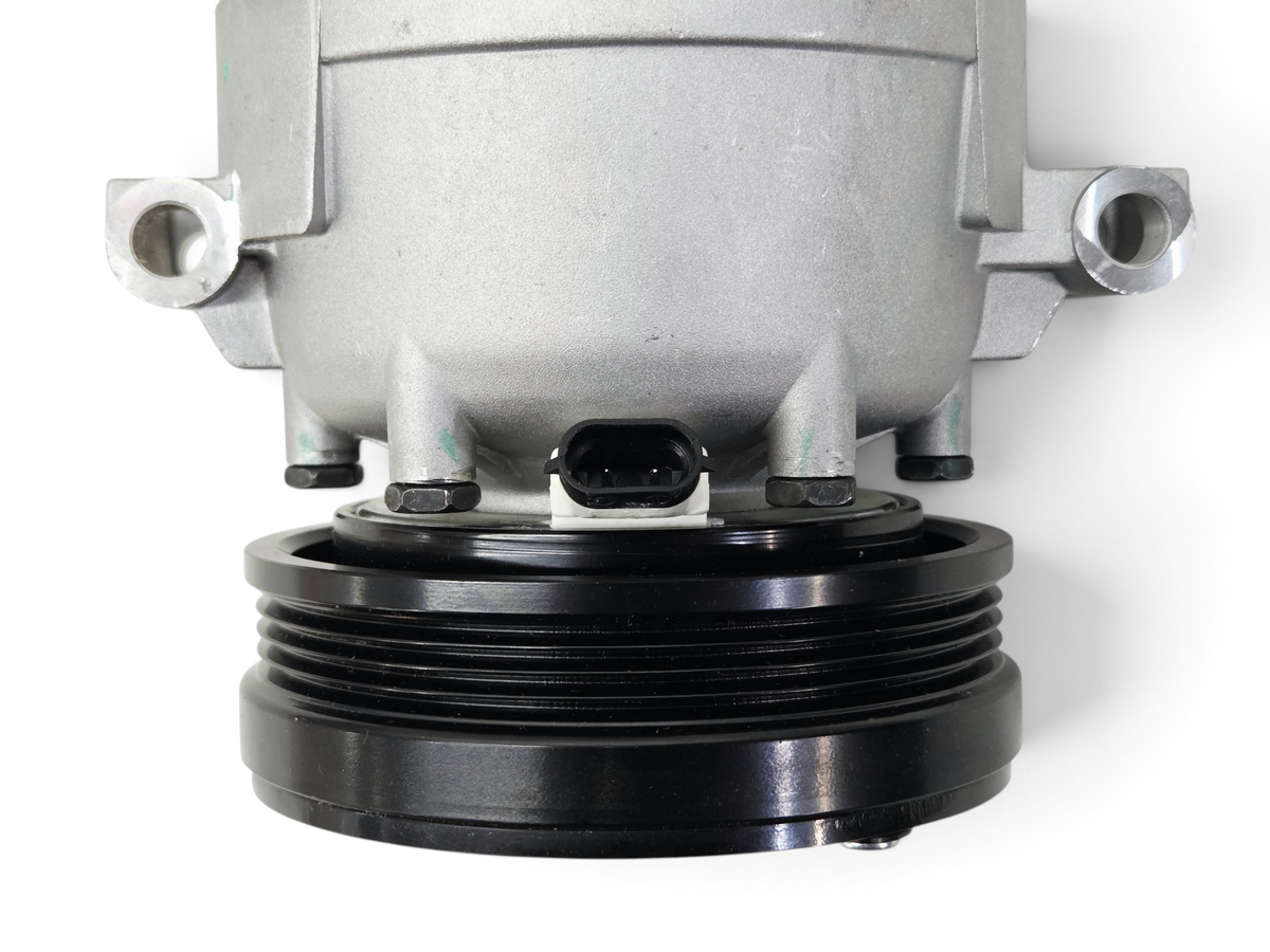 Send it Auto Parts Four Seasons AC compressor for 1997-2004 Corvette C5, featuring a silver housing and black pulley.