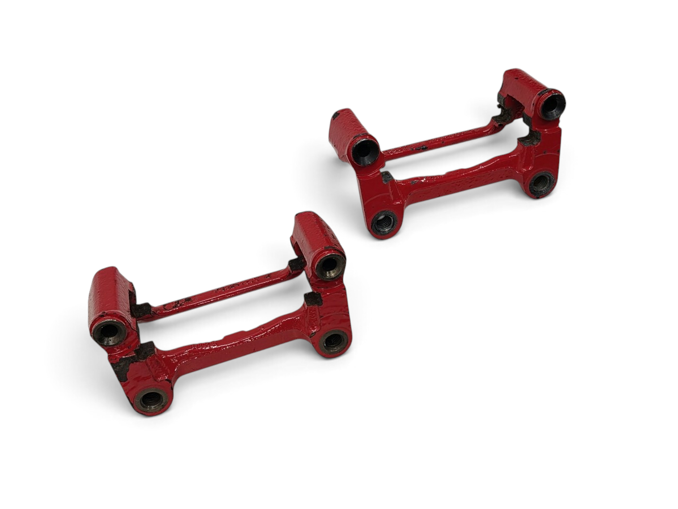 Send it Auto Parts OEM GM rear brake caliper brackets for 2001-2004 Corvette C5 with red painted finish