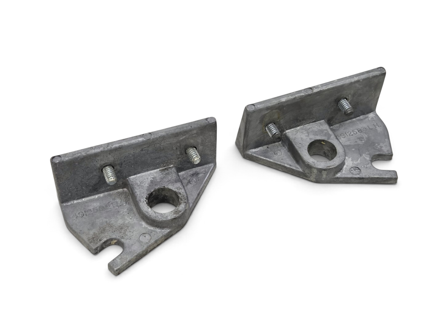 Send it Auto Parts OEM GM 1963-1967 Corvette C2 headlight motor brackets with bolts, cast metal finish.