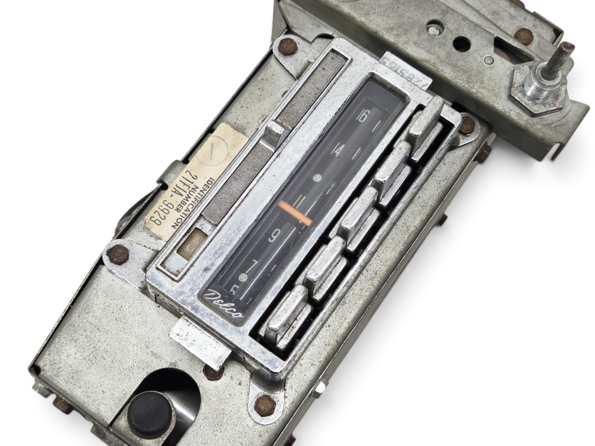 Send it Auto Parts vintage Delco AM FM radio for 1963-1967 Corvette C2 with chrome trim and original part number