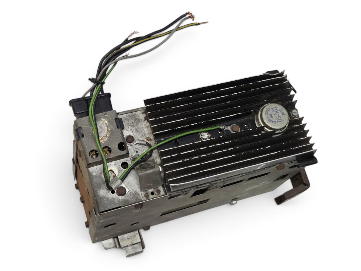 Send it Auto Parts OEM AM FM radio for 1963-1967 Corvette C2 with metal casing and black cooling fins