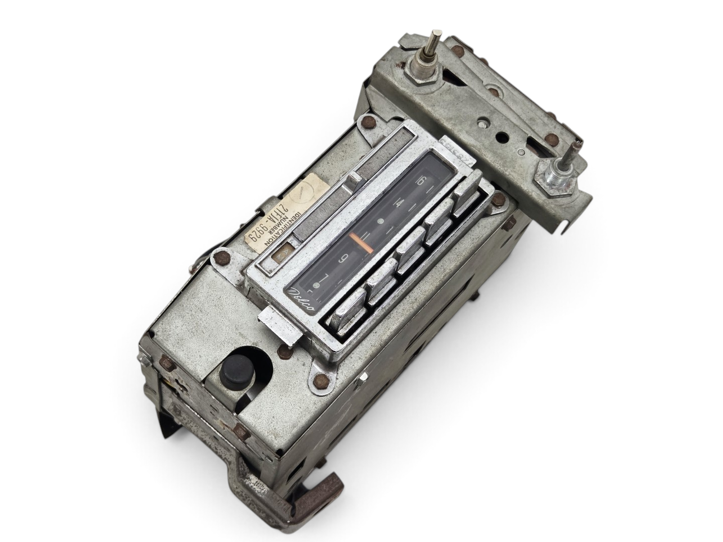 Send it Auto Parts vintage 1963-1967 Corvette C2 Delco AM FM radio unit, OEM GM part 7285155 in metallic finish.