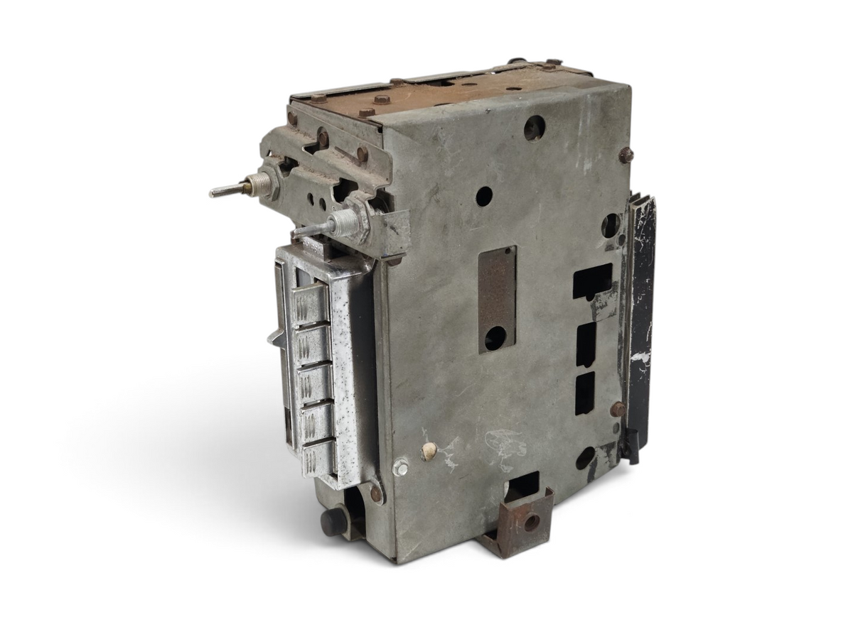 Send it Auto Parts vintage 1963-1967 Corvette C2 AM FM radio, OEM GM part 7285155 in original metal housing.