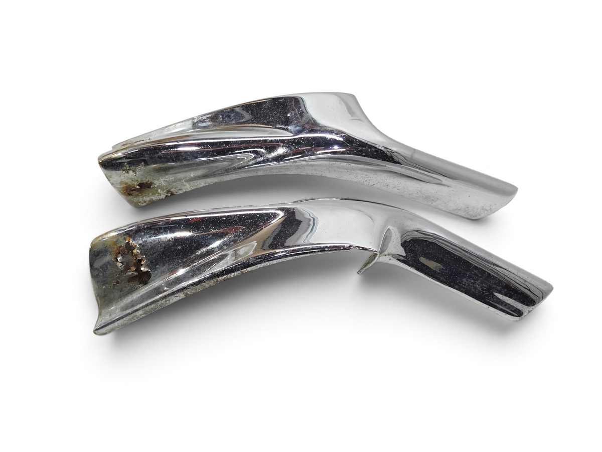 Send it Auto Parts pair of chrome 1968-1969 Corvette C3 front bumper guards showing signs of rust for restoration