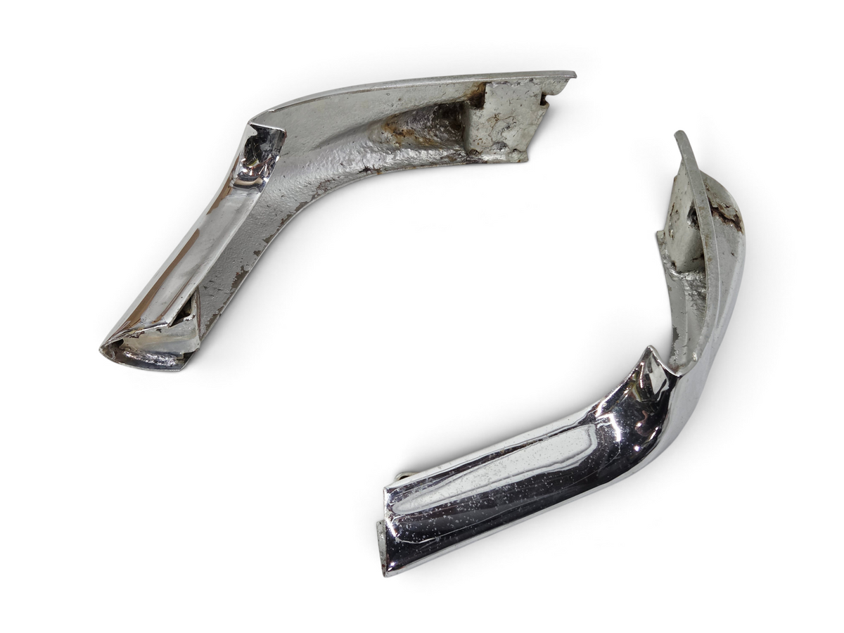 Send it Auto Parts pair of 1968-1969 Corvette C3 front bumper guards in chrome with visible rust for restoration.