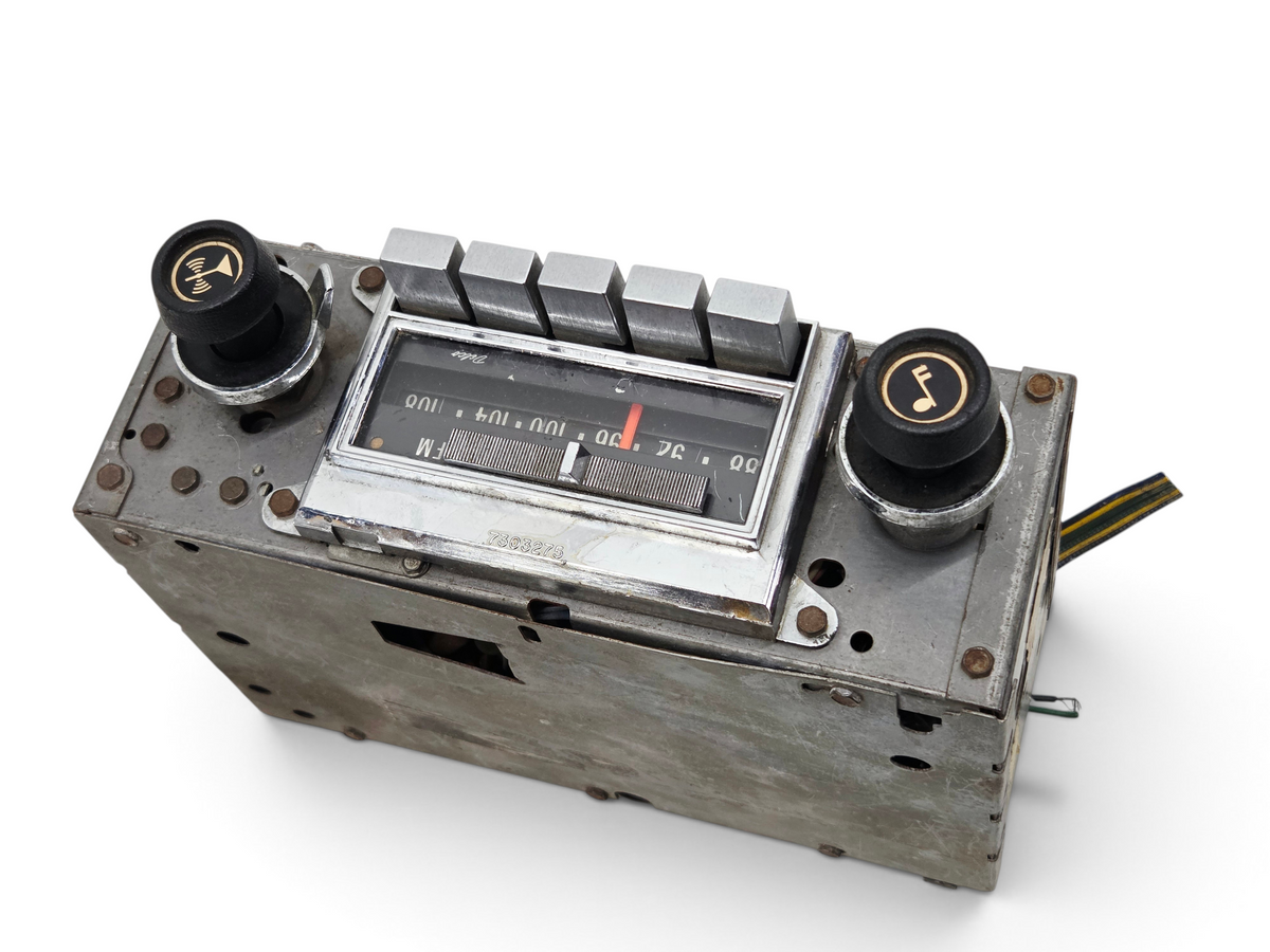 Send it Auto Parts vintage 1972-1976 Corvette C3 Delco AM FM radio with chrome trim and black knobs