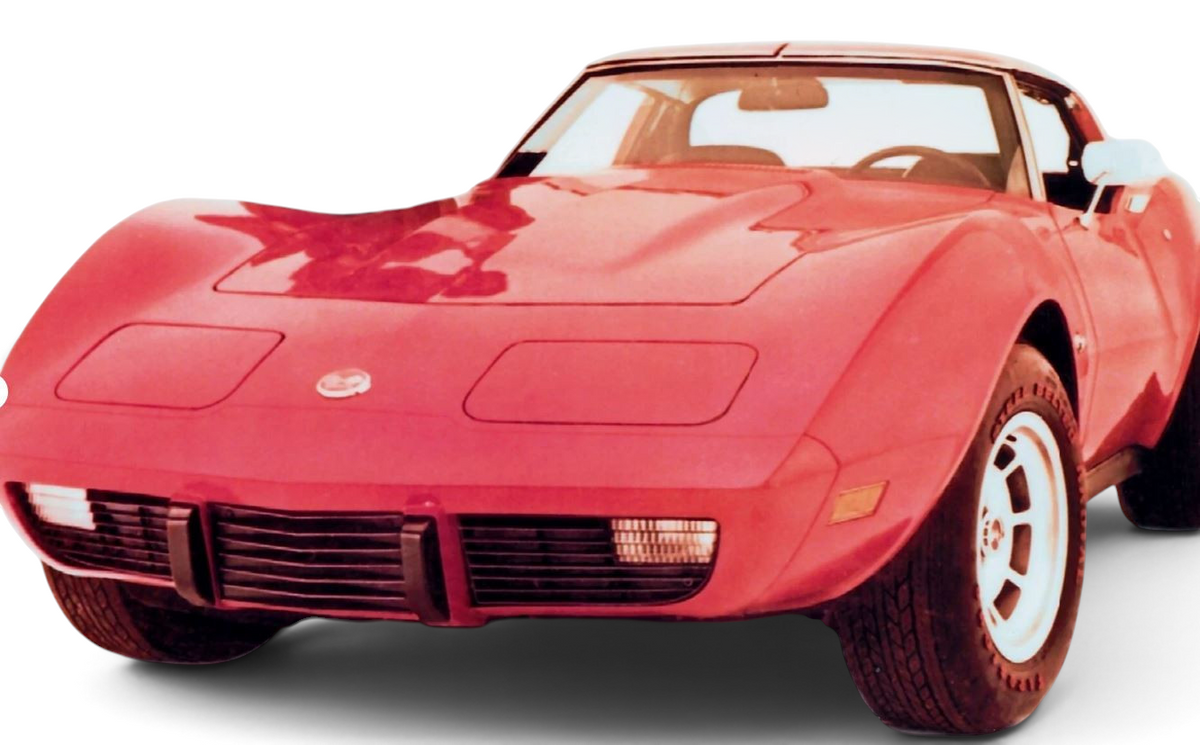 Send it Auto Parts Grillmate front license plate filler installed on a red 1975-1979 Chevrolet Corvette C3